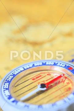 Map and compass Stock Photos