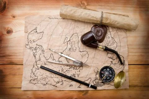 Map and compass Stock Photos