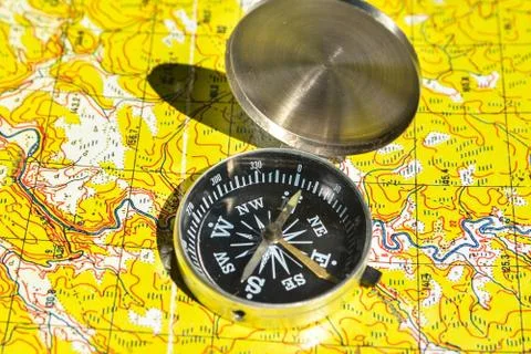 Map and compass. Stock Photos