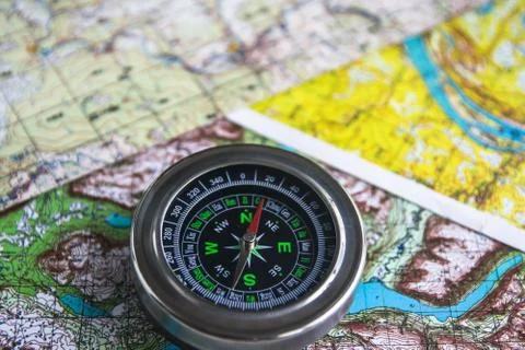 Map and compass. Stock Photos