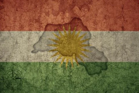 Map and flag of kurdistan on a old vintage crack paper background . Stock Photos