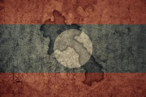 Map and flag of laos on a old vintage crack paper background . Stock Photos