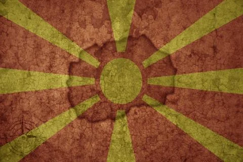Map and flag of macedonia on a old vintage crack paper background . Stock Photos
