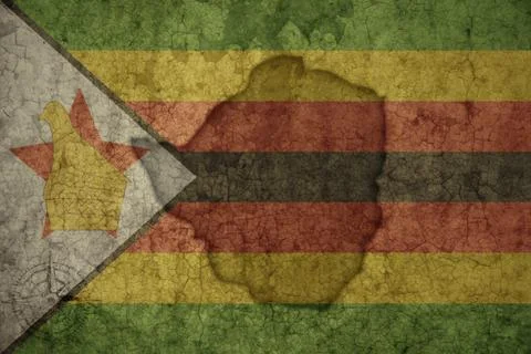 Map and flag of zimbabwe on a old vintage crack paper background . Stock Photos