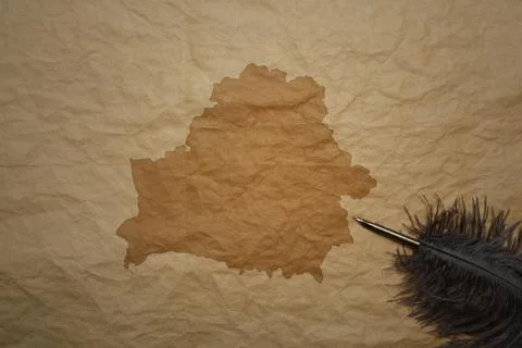 Map of belarus on a old paper background with old pen Stock Photos