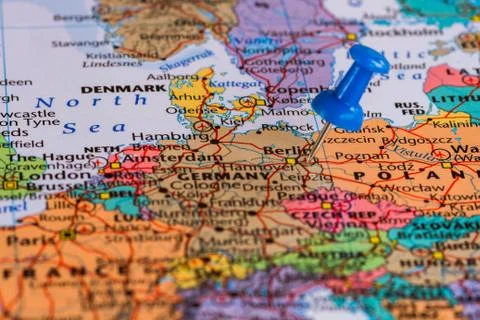 Map of Berlin with a blue pushpin stuck Stock Photos