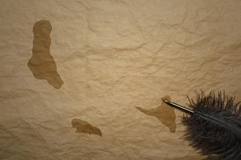 Map of comoros on a old paper background with old pen Stock Photos