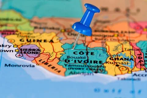 Map of Cote d'ivoire with a blue pushpin stuck Stock Photos