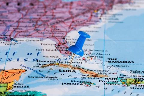 Map of Cuba with a blue pushpin stuck Stock Photos