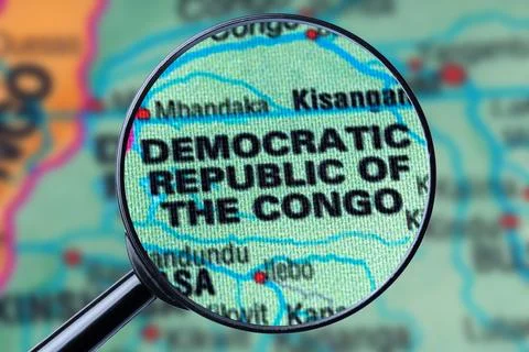 Map of DEMOCRATIC REPUBLIC OF THE CONCO through magnifying glass. Stock Photos