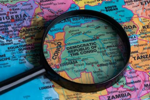Map of Democratic republic of the congo through magnifying glass.Close-up. Stock Photos