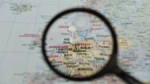 Map exploration with a magnifying glass Video stock 343288212