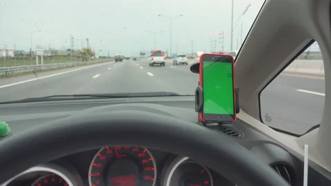 The map gps navigation on modern smartphone green screen device gadget mounted Stock Footage 157300488