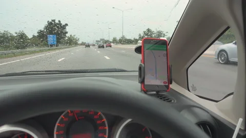 The map gps navigation on modern smartphone device gadget mounted Stock Footage 171645946