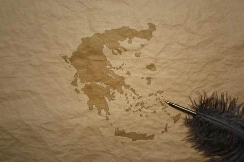 Map of greece on a old paper background with old pen Stock Photos