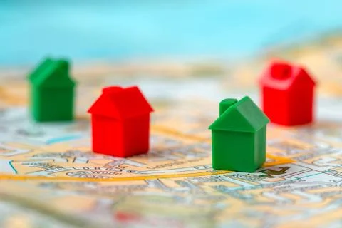 Map with group of small cute miniature houses Stock Photos