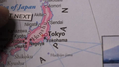Map of Japan with Visit Next paper strip placed near Tokyo for travel plannin Stock Footage 346576399