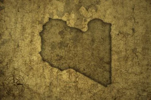 Map of libya on a old vintage crack paper background . Stock Photos