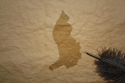 Map of liechtenstein on a old paper background with old pen 스톡 사진
