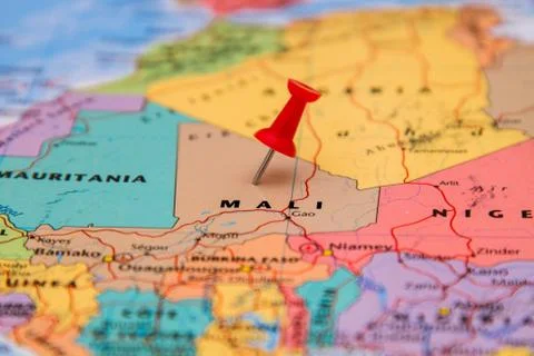Map of Mali with a red pushpin stuck Stock Photos