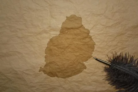 Map of mauritius on a old paper background with old pen Stock Photos