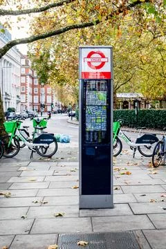 Map of Mayfair on Cycles stand, directions to Green Park and hyde Park, Lime Stock Photos