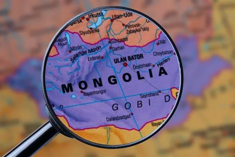 Map of MONGOLIA through magnifying glass. Stock Photos