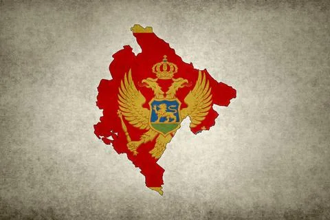 Map of Montenegro with its flag on a paper Stock Illustration