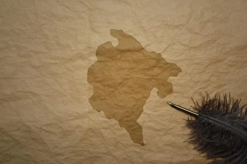 Map of montenegro on a old paper background with old pen Stock Photos