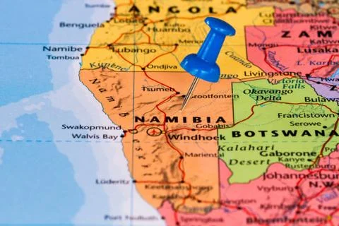 Map of Namibia with a blue pushpin stuck Stock Photos