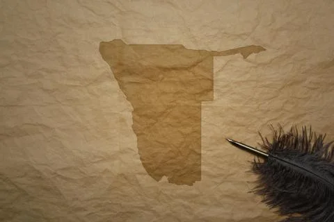Map of namibia on a old paper background with old pen Stock Photos