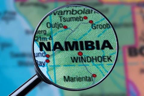 Map of NAMIBIA through magnifying glass. Stock Photos