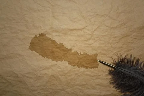 Map of nepal on a old paper background with old pen Foto stock