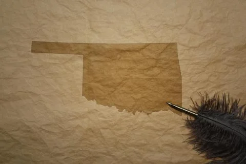 Map of oklahoma state on a old paper background with old pen Stock Photos