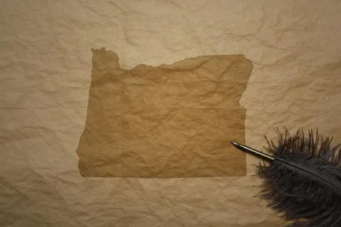 Map of oregon state on a old paper background with old pen Stock Photos