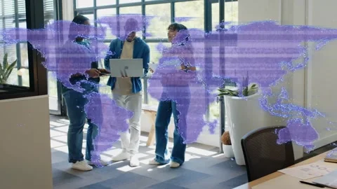 Map overlay appearing and sweeping, causing team leaning in office reading Stock Footage 330959714