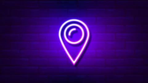 Map pin neon sign animation..Brick Wall Background.4K motion animation. Stock Footage 255590458