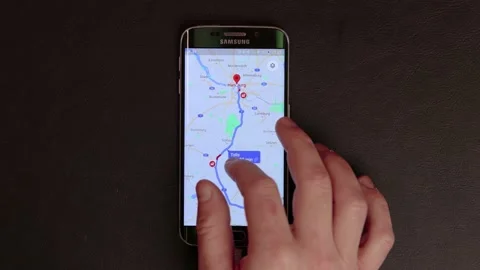 Map planning on Google Maps on a smartphone Stock Footage 218411520