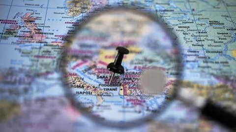 Map of Podgorica with a focus on a specific location using a magnifying glass Stock Photos