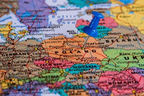 Map of Poland with a blue pushpin stuck Stock Photos