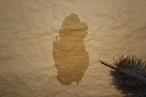 Map of qatar on a old paper background with old pen Stock Photos