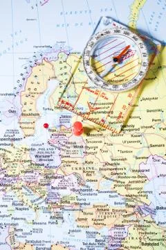 Map with red pins and compass Stock Photos