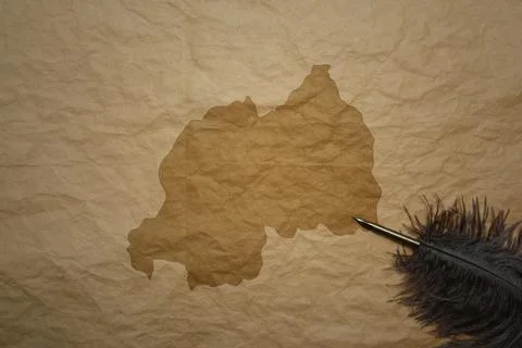 Map of rwanda on a old paper background with old pen 스톡 사진