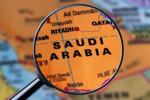 Map of SAUDI ARABIA through magnifying glass. Stock Photos