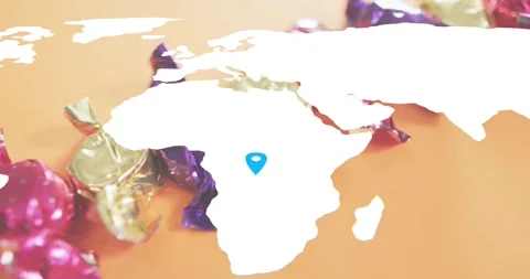 Map silhouette opening on candy wrappers starting blue pins marking regions Stock Footage 316963417