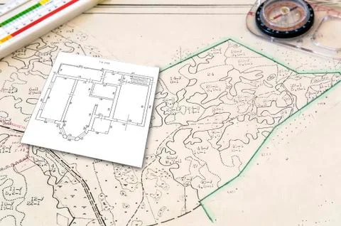 Map a small land and plan homes. Stock Photos