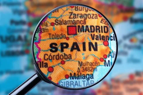 Map of SPAIN through magnifying glass. Stock Photos
