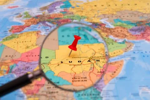 Map of Sudan with a red pushpin stuck Stock Photos