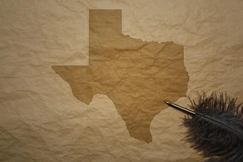 Map of texas state on a old paper background with old pen Stock Photos