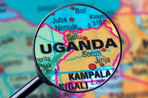 Map of UGANDA through magnifying glass. Stock Photos